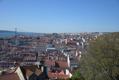 High angle view of townscape against blue sky