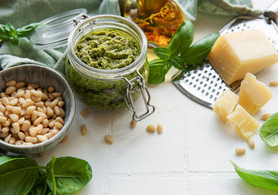 Fresh made pesto sauce. green basil pesto. ingredient for pesto sauce 