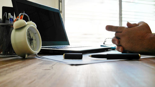 Man using laptop on table