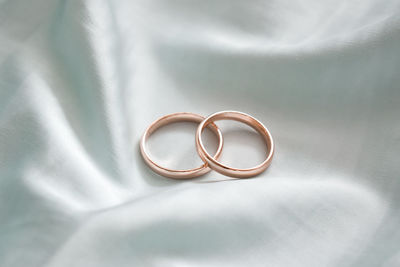 High angle view of wedding rings