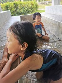 Happy girl and woman in water