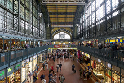 People walking at railroad station