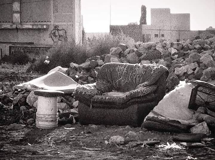 building exterior, built structure, architecture, abandoned, day, obsolete, stack, damaged, outdoors, old, house, rock - object, sunlight, working, transportation, field, deterioration, garbage, run-down, sitting