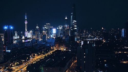 Illuminated cityscape at night