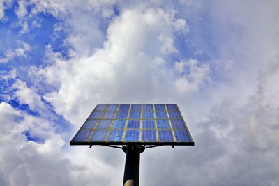 Solar panel under cloudy sky