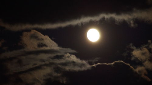 Scenic view of moon against sky during sunset