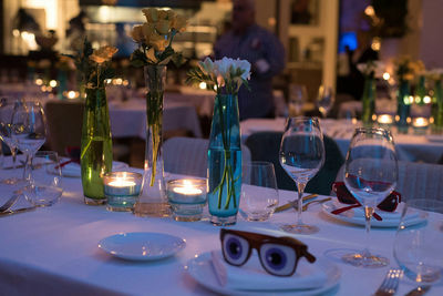 Close-up of wine glasses on table at restaurant