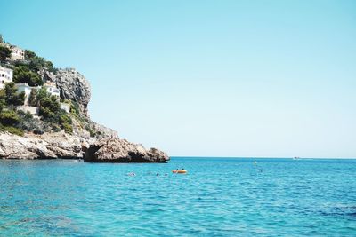 Scenic view of sea against clear sky