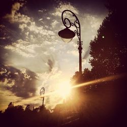 Low angle view of street light against sky