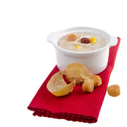 High angle view of breakfast on table against white background