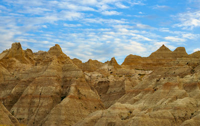 Scenic view of rock formations against sky