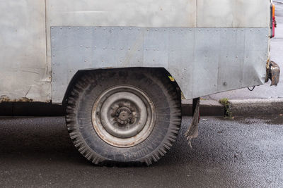 Close-up of tire track on road