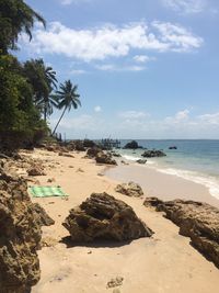 Scenic view of beach against sky