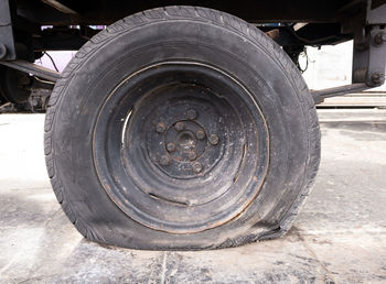 Close-up of tire tracks in field