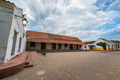 Houses by street in city