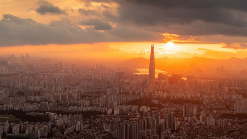 High angle view of cityscape against sky during sunset