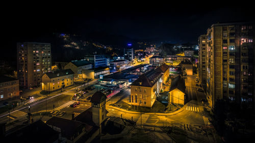 High angle view of illuminated cityscape at night