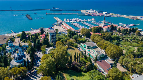 High angle view of city by sea