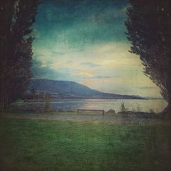 Scenic view of landscape against cloudy sky