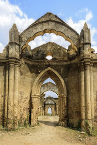 Low angle view of old building against sky