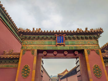 Low angle view of temple building against sky