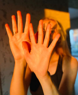 Cropped image of woman holding hands