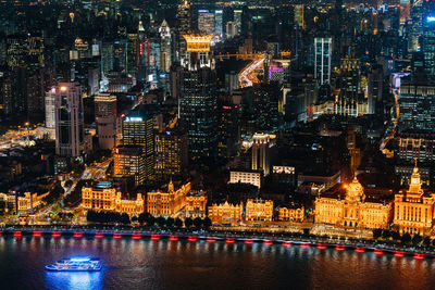 Illuminated buildings in city at night