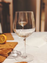 Close-up of wineglass on table