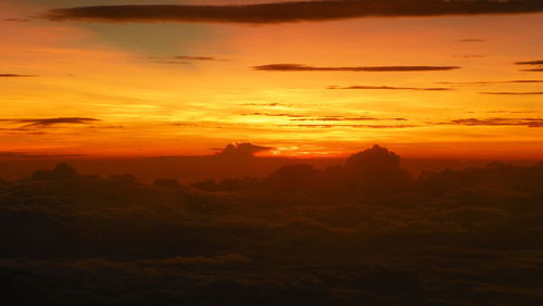 Scenic view of dramatic sky during sunset