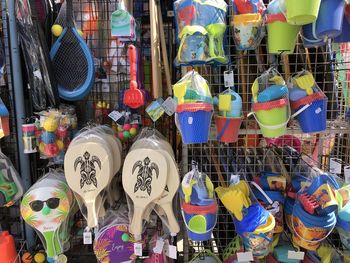 Multi colored decorations for sale at market stall