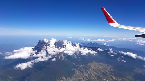 Airplane flying in sky