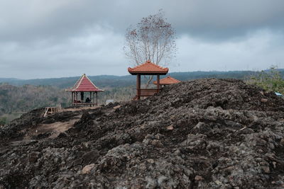 Traditional house from java with landscape againt sky