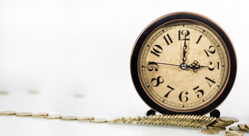 Close-up of clock on white background