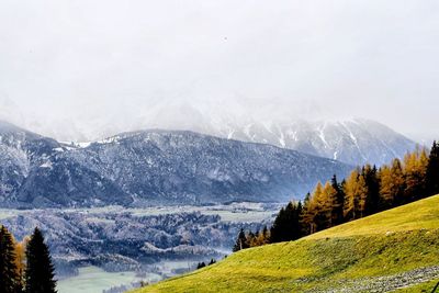 Scenic view of snow covered mountains