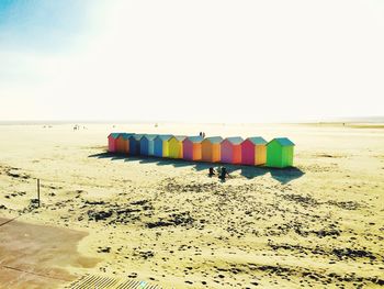 Multi colored huts on beach in france