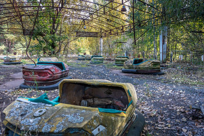 Abandoned car in forest