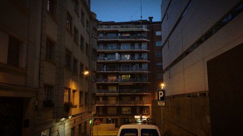 Low angle view of illuminated building at night