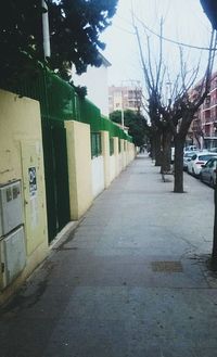 Road along buildings in city