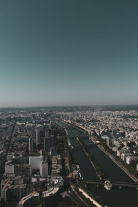 High angle view of city buildings against clear sky