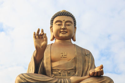 Low angle view of buddha statue