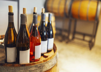 Close-up of wine bottles on table