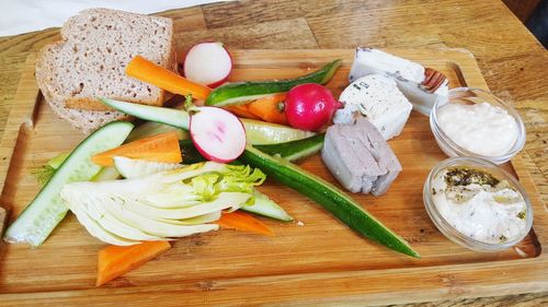 High angle view of chopped vegetables on cutting board