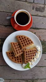 High angle view of coffee cup on table