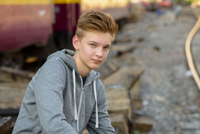 Portrait of young man looking at camera