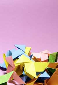 Close-up of multi colored pencils on paper