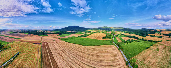 Aerial view of agricultural and green fields in countryside