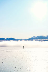 Scenic view of mountains against sky during winter