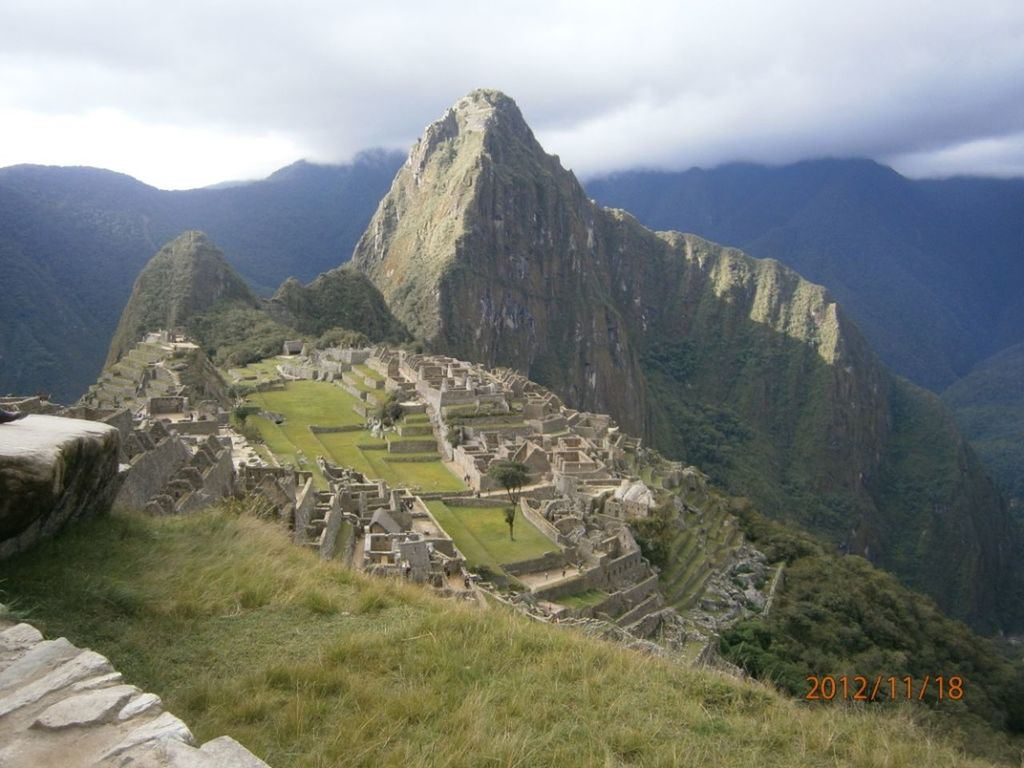 mountain, sky, mountain range, landscape, tranquility, tranquil scene, scenics, cloud - sky, beauty in nature, nature, famous place, travel destinations, history, ancient, cloudy, travel, tourism, non-urban scene, cloud, built structure