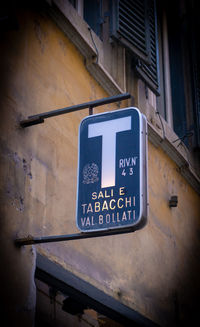 Low angle view of information sign on building