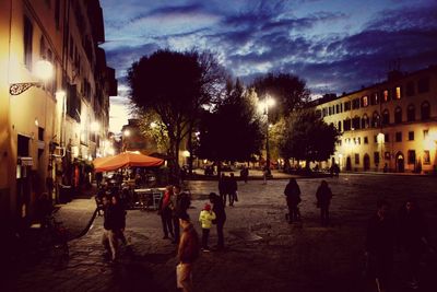 People walking on city street